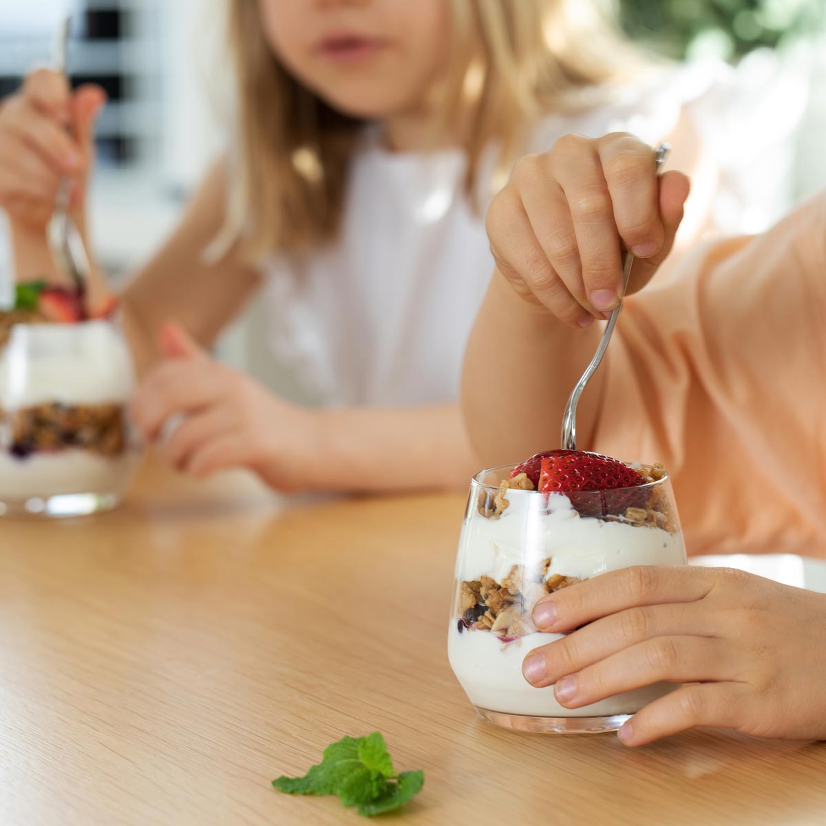 back-to-school breakfast ideas, kids eating parfait